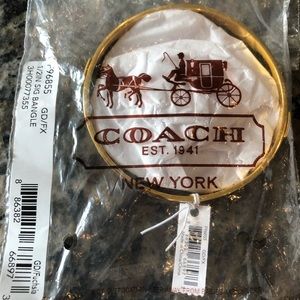 Brand new Coach bracelet gold and fuchsia